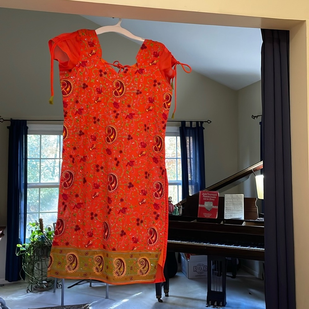 Lovely Kurtha with beautiful embroidery. Very fashionable and festive.